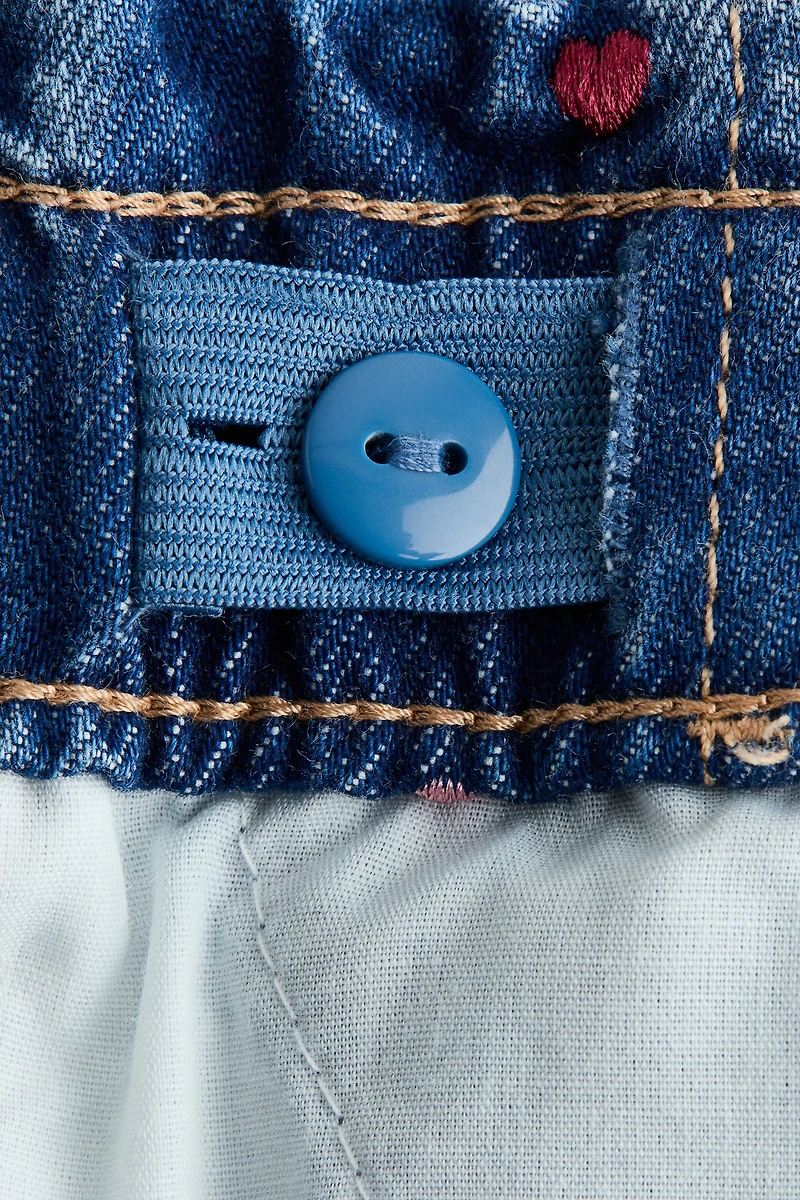 Jean jambes larges sur taille élastique