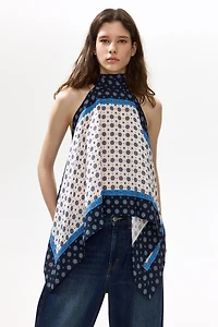 Haut dos nu en satin