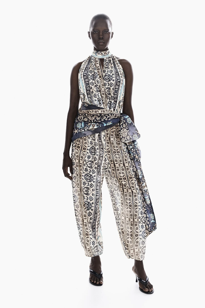 Combi-pantalon dos nu avec détail à nouer