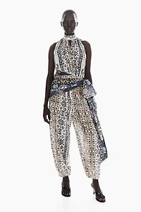 Combi-pantalon dos nu avec détail à nouer