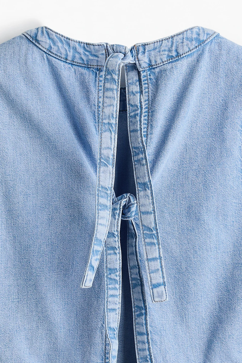 Haut en denim avec dos ouvert