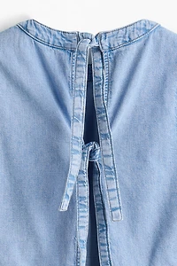 Haut en denim avec dos ouvert