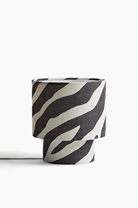 Small fabric-covered table lamp