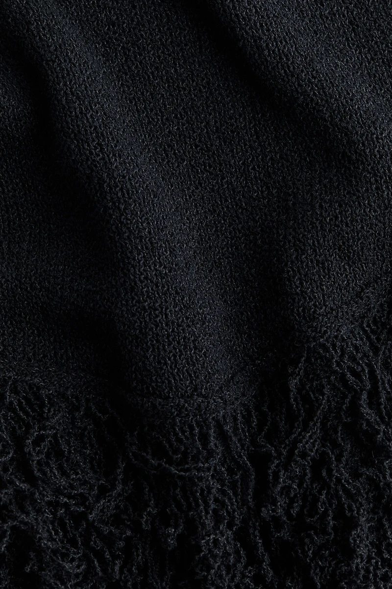 Robe en tricot avec franges