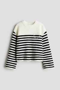 Chandail orné de strass