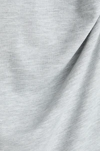 Haut asymétrique avec col cheminée