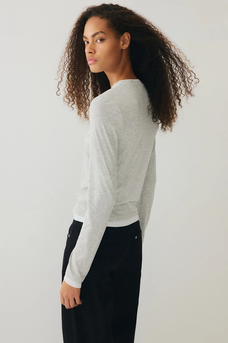 Haut à effet superposé