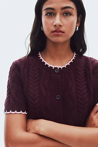 Gilet en tricot torsadé