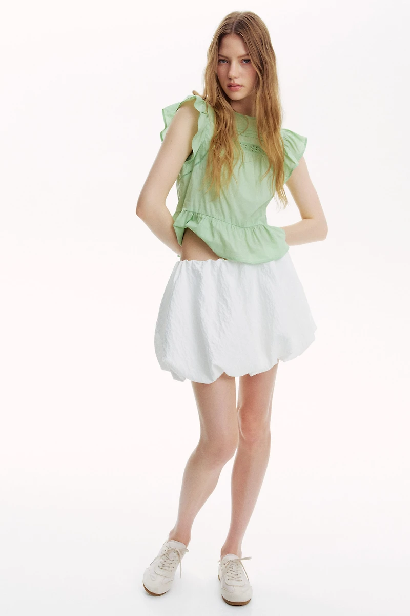 Lace-Inset Peplum Blouse