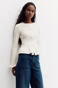 Gilet péplum en tricot côtelé