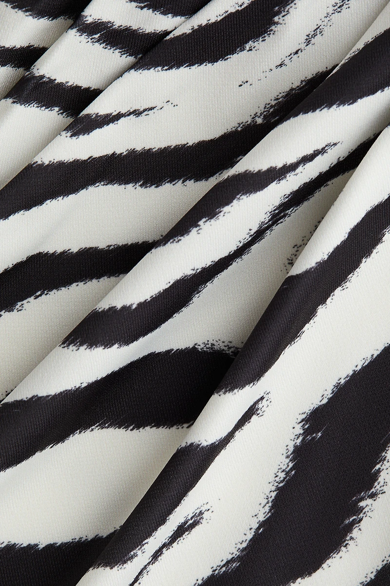 Haut à effet drapé