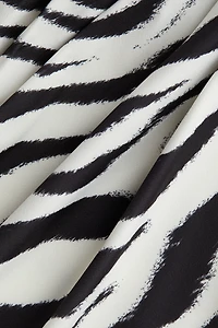 Haut à effet drapé