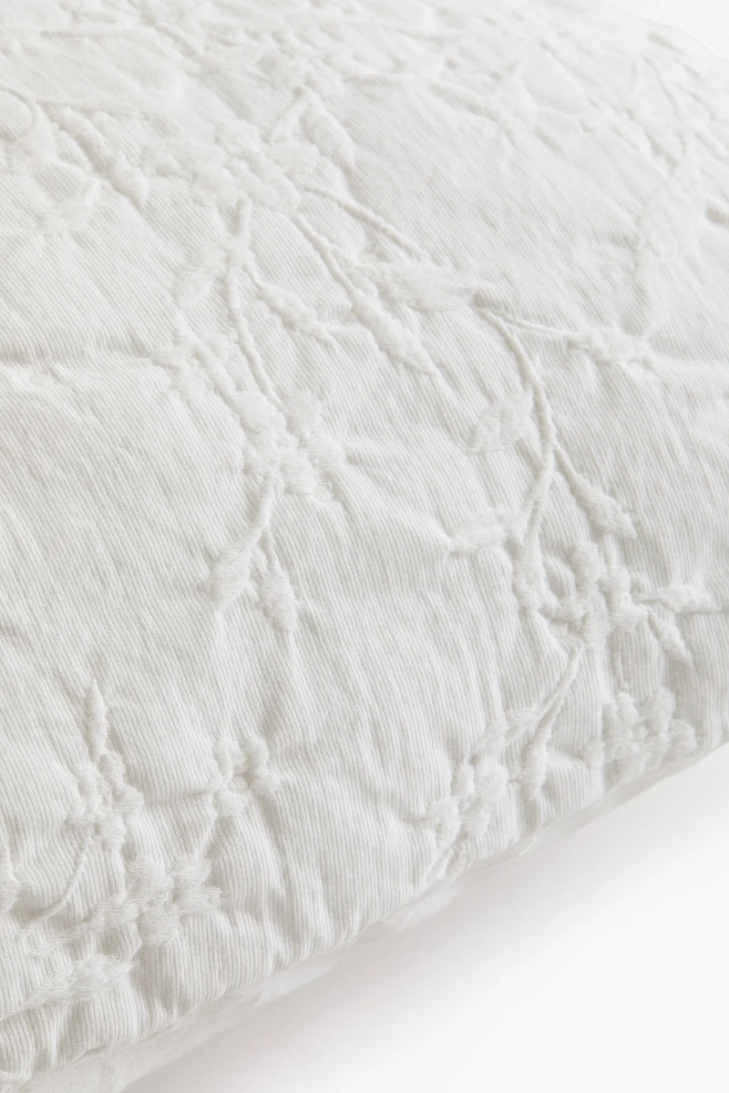 Housse de coussin en tissu jacquard