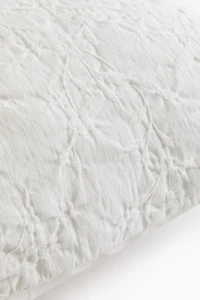 Housse de coussin en tissu jacquard