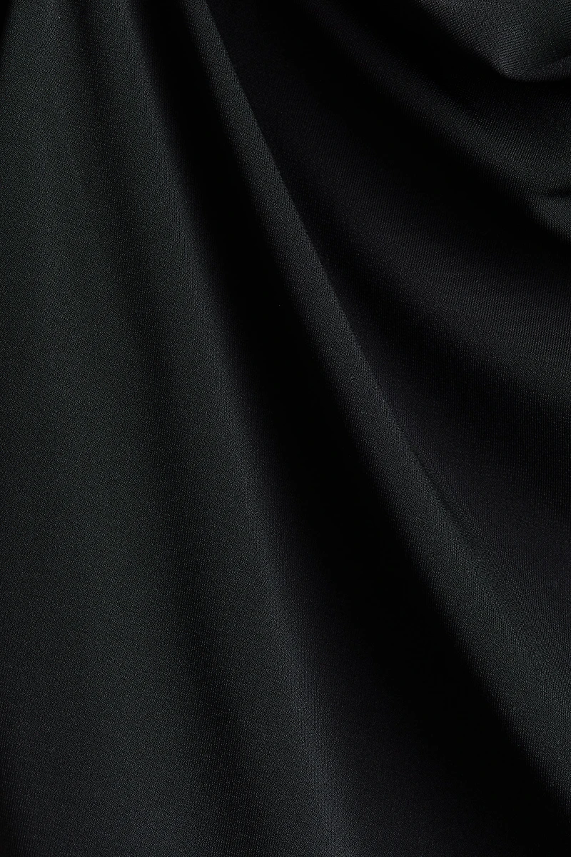 Draped Asymmetric Top
