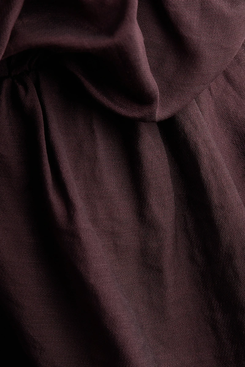 Robe asymétrique avec bretelles fines