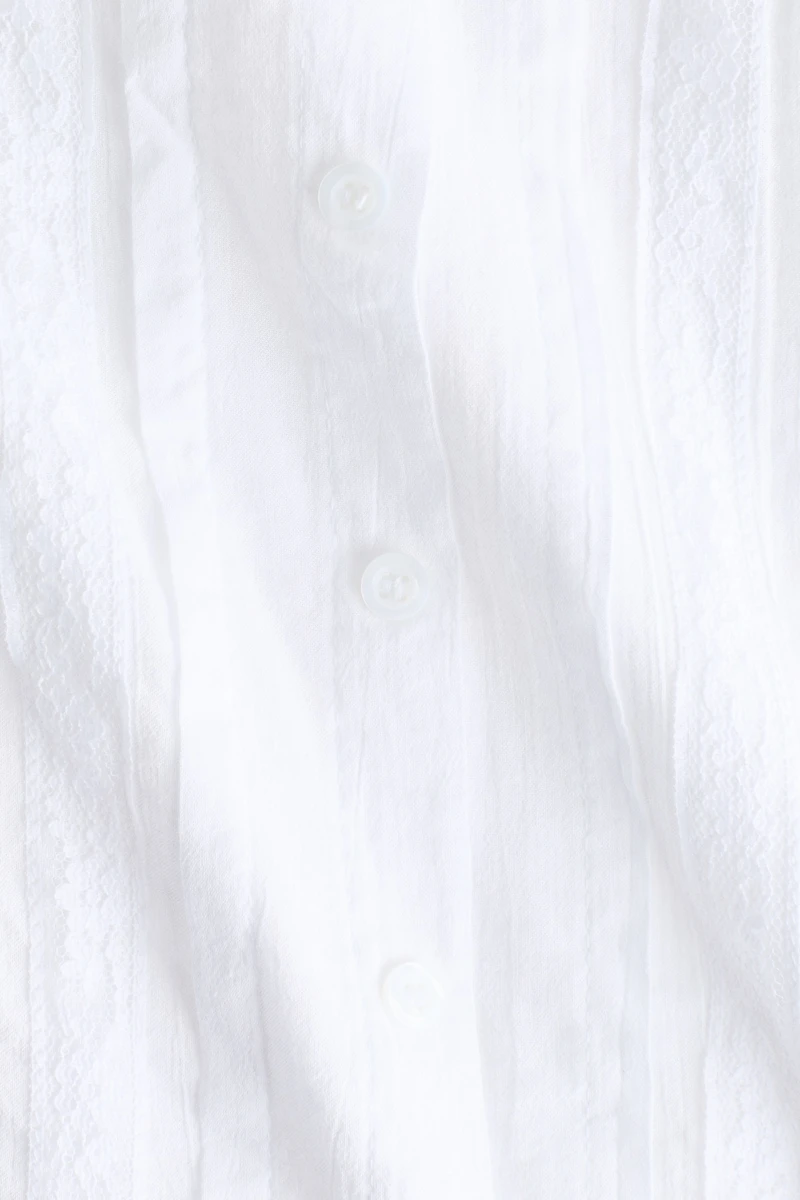 Blouse à plis nervurés