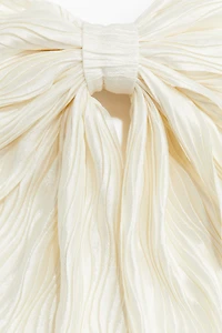 Pince à cheveux ornée d'un nœud
