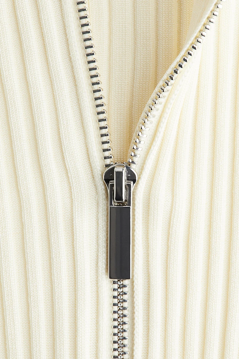 Haut côtelé avec col à fermeture éclair