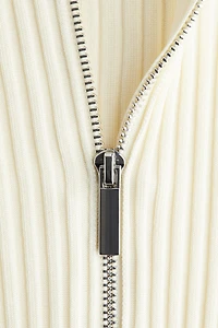 Haut côtelé avec col à fermeture éclair