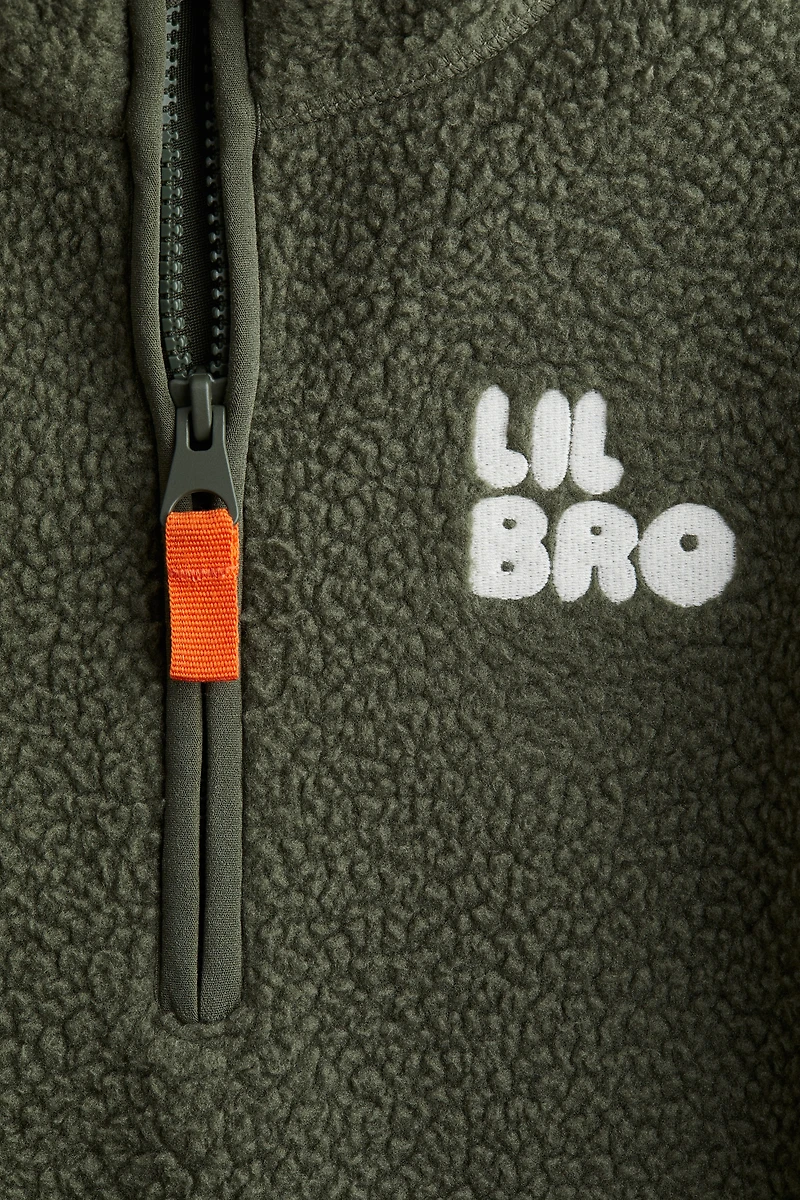 Chandail en polar avec col à fermeture éclair