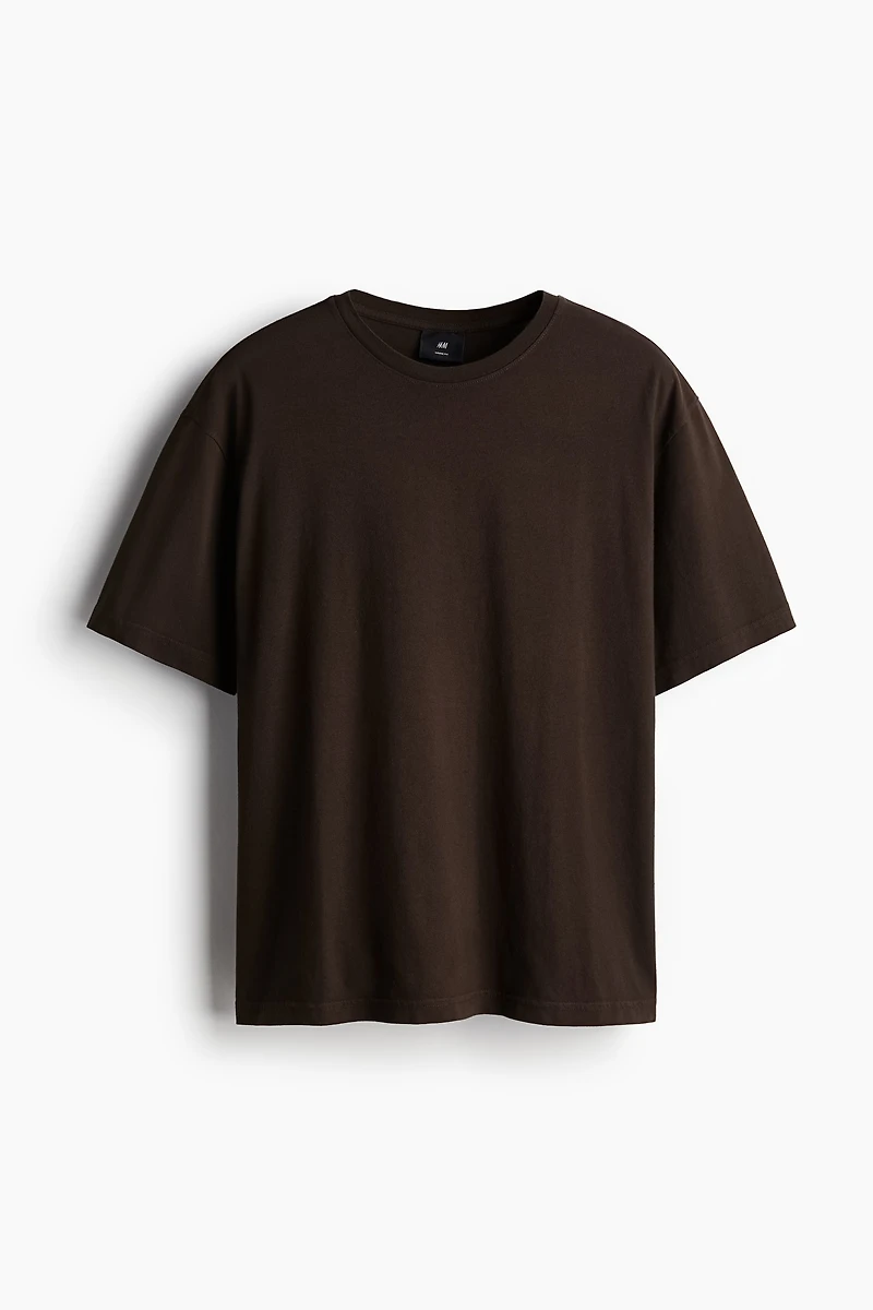 T-shirt flottant à l'aspect délavé