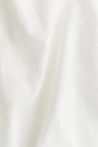 Blouse en tissu jacquard