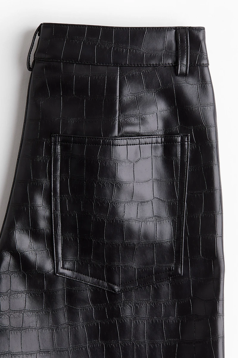 Pantalon en tissu enduit