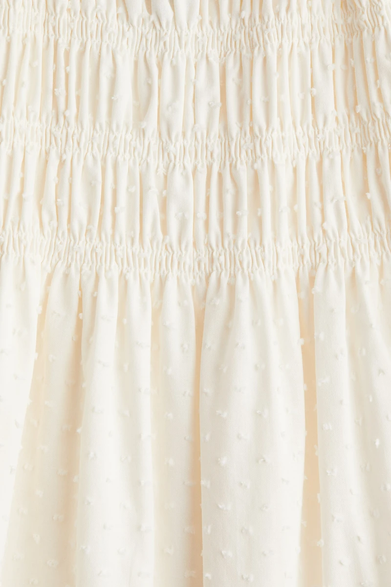 Robe en coton à corsage nid d'abeille