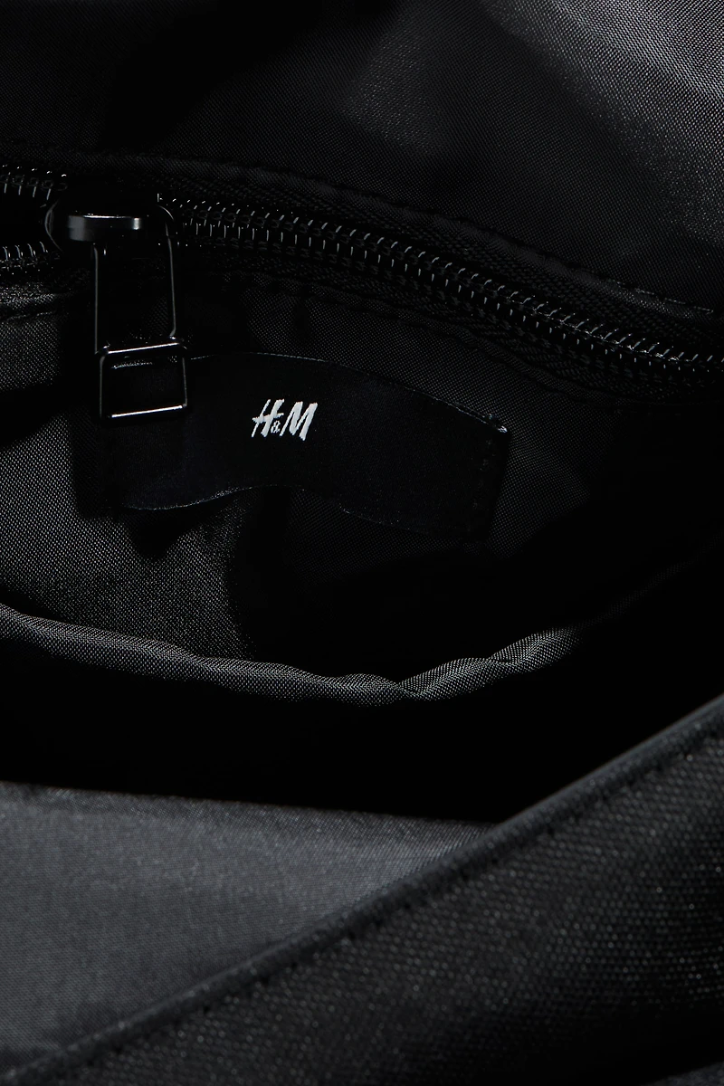 Sac à dos à rabat enroulable