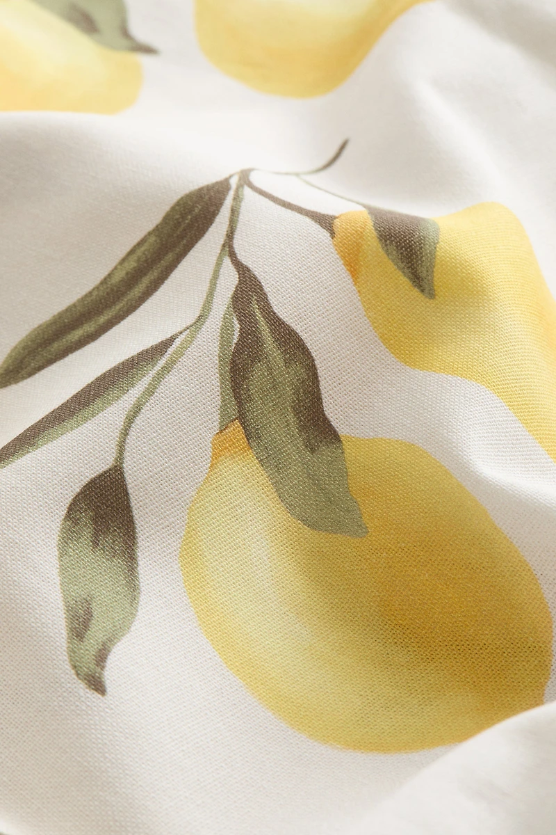 Housse de coussin à motif