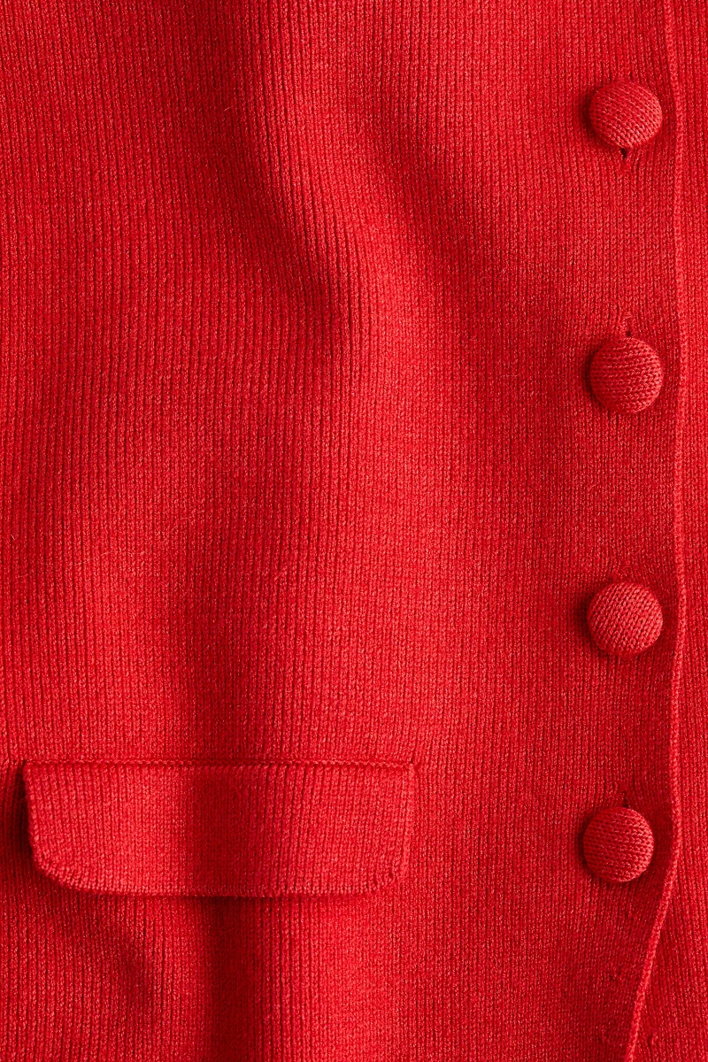 Gilet en tricot côtelé à encolure dégagée