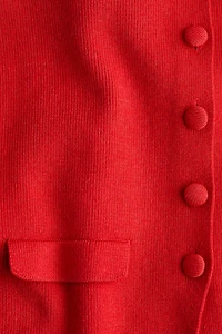 Gilet en tricot côtelé à encolure dégagée