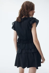 Blouse volantée en satin