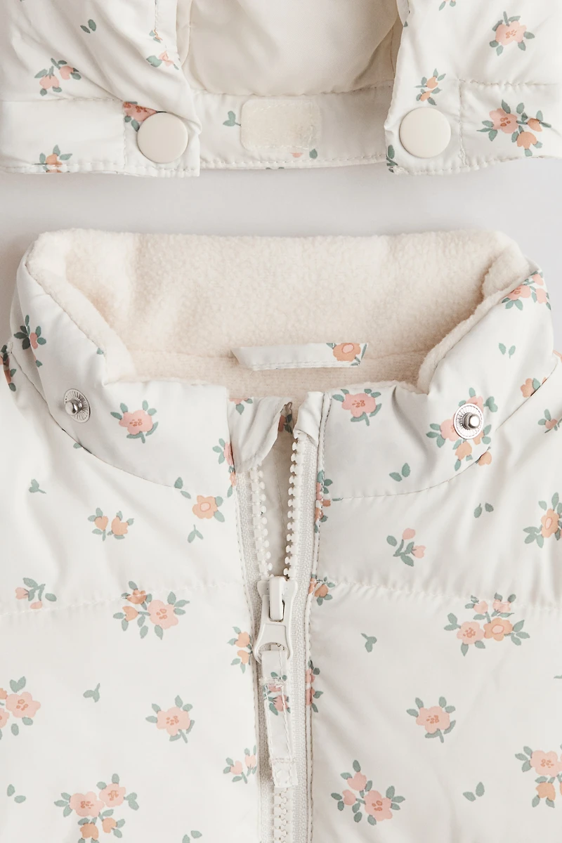 Manteau en duvet déperlant