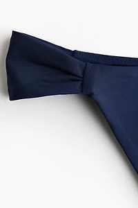 Bas de maillot Tanga échancré