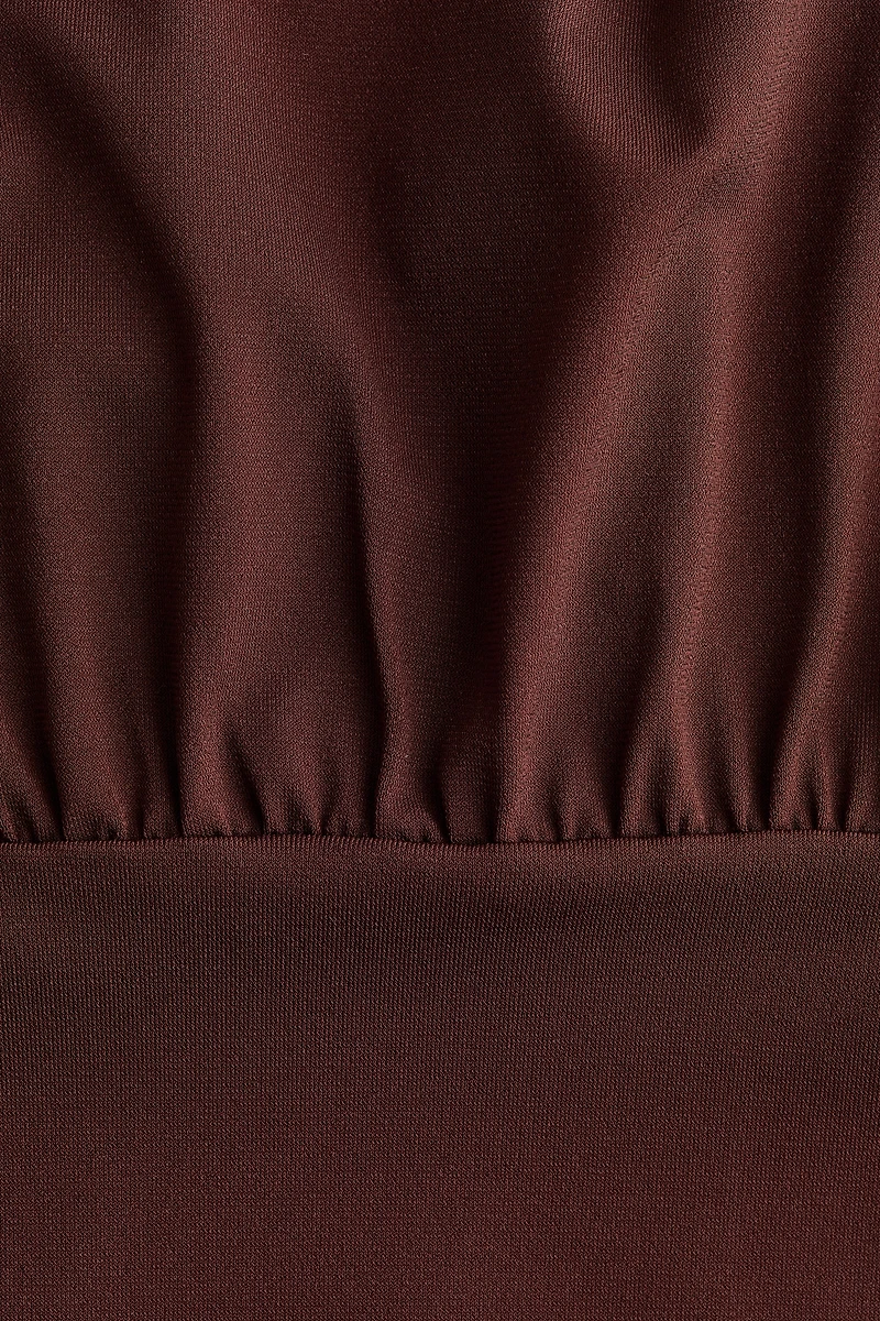 Cape-Sleeved Low-Back Dress