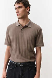 Polo près du corps en jersey texturé
