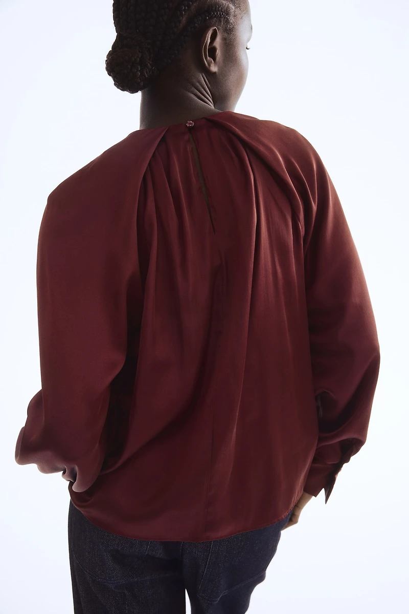 Blouse en satin avec manches ballon