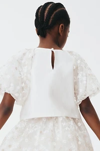 Blouse à manches bouffantes