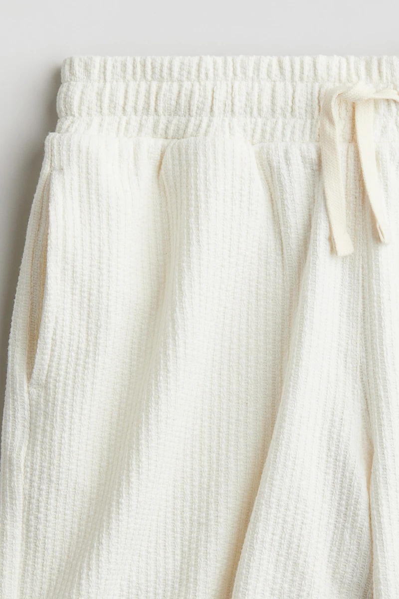 Short en tricot texturée