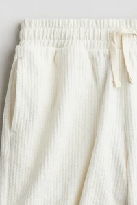 Short en tricot texturée