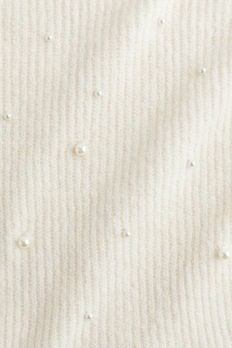 Bead-Embellished Peplum Top