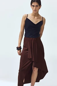 Jupe asymétrique avec panneau drapé
