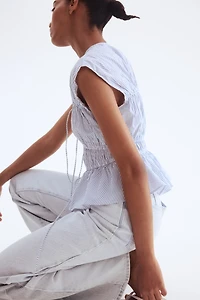 Blouse en popeline avec cordons de serrage