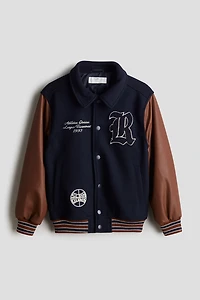 Veste de baseball avec applications