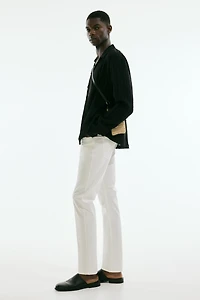 Pantalon aminci en tissu croisé de coton