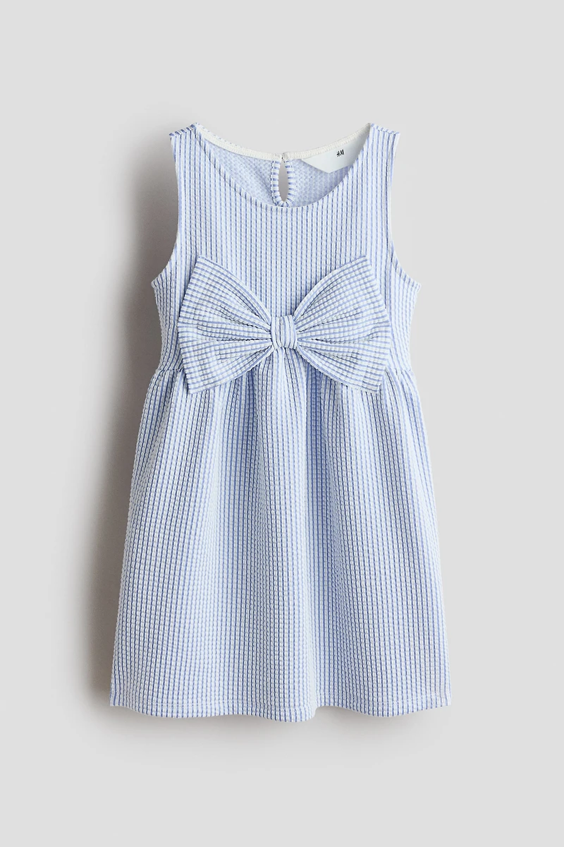 Robe avec boucle devant