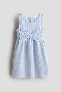 Robe avec boucle devant