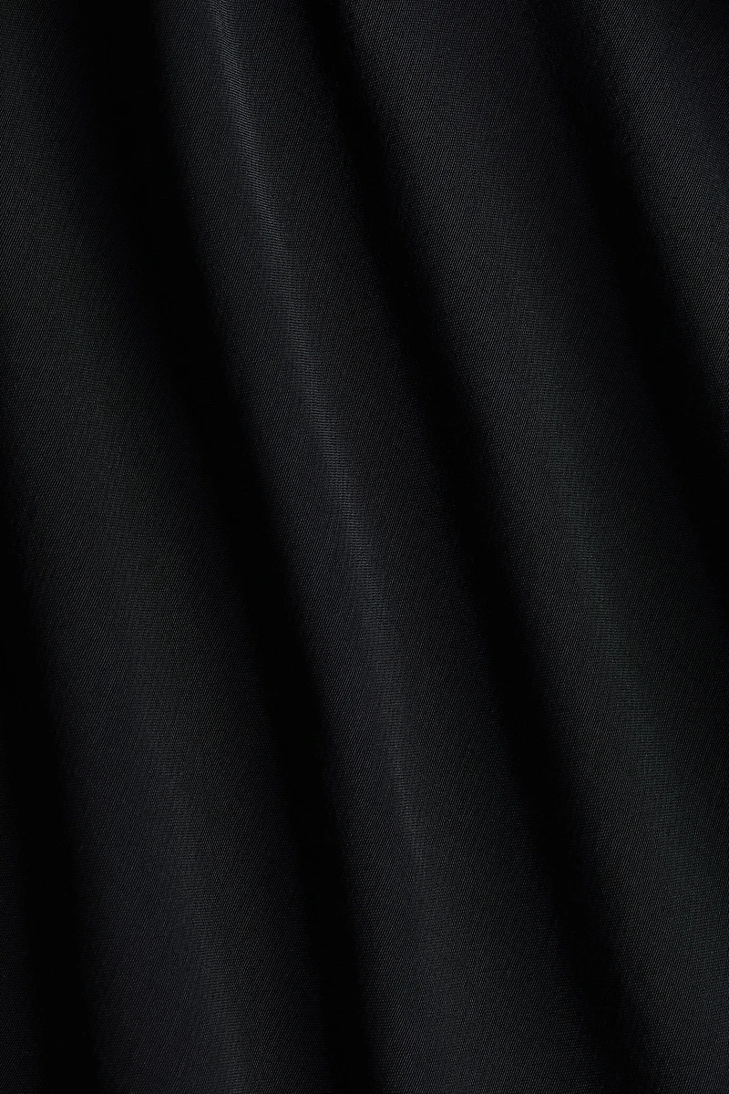 Blouse cape asymétrique